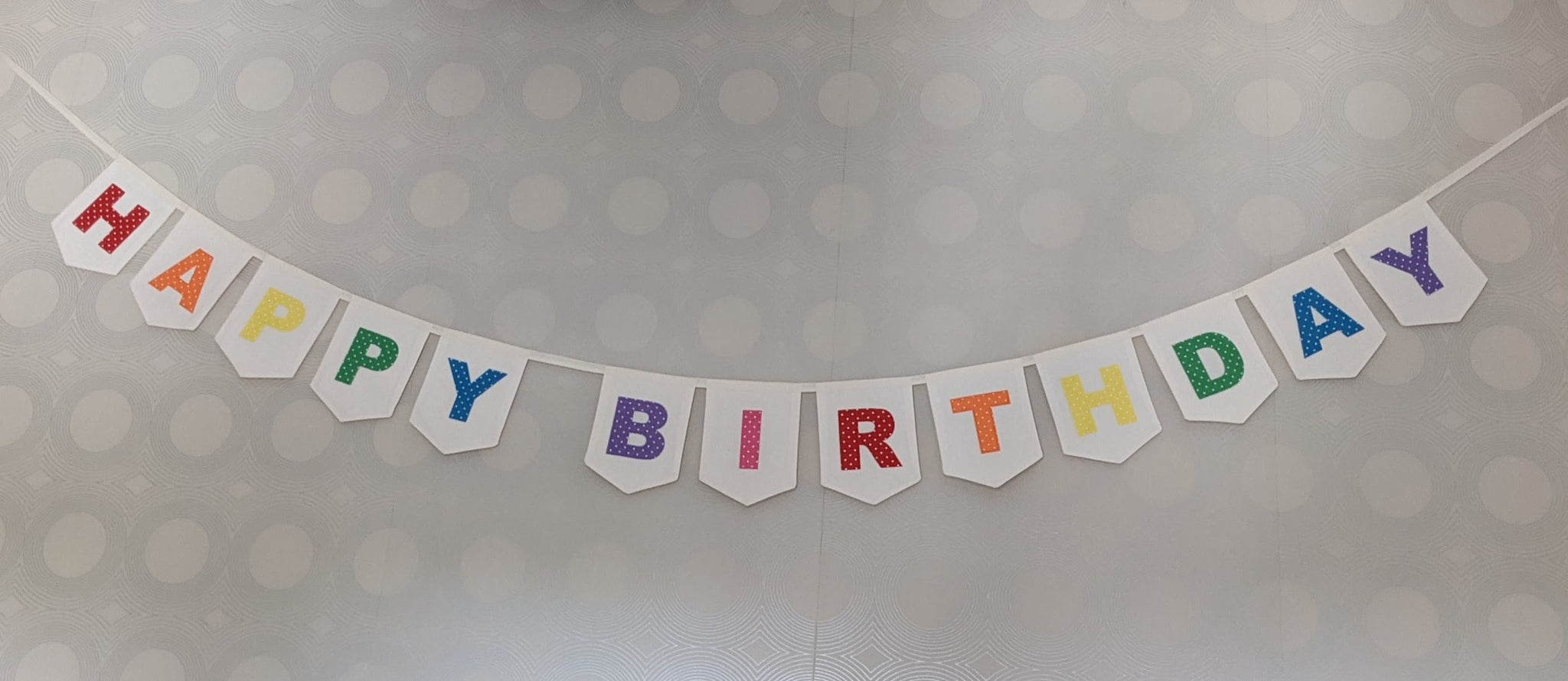 Bright Rainbow Coloured 'Happy Birthday' Fabric Bunting on one strings