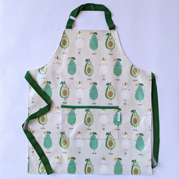 Large , Lined, Wipeable, Kids Pear and Avocado Oilcloth Apron, with front pocket and adjustable green neck band and green ties and trim.