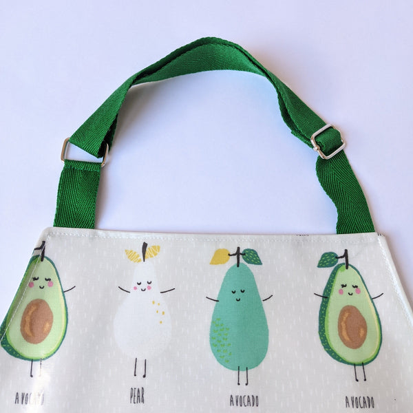 Close up of green adjustable neck band on Pear and Avocado Kids Oilcloth Apron