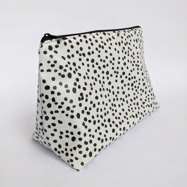 Side View of Large, Dottie Monochrome Design, Lightweight Oilcloth Pouch, Wipeable with Black Lining