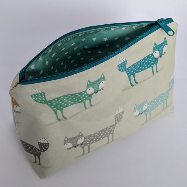 Unzipped, Medium Teal Fox Oilcloth Make-up, Cosmetic, Toiletry bag with Teal Stars Oilcloth Lining